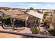 Charming desert home with covered patio and drought-tolerant landscaping at 8212 E Masters Rd, Gold Canyon, AZ 85118