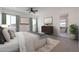 Relaxing main bedroom featuring large windows, ensuite bathroom and neutral tones at 9398 E Cloudview Ave, Gold Canyon, AZ 85118