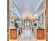 Elegant bathroom with dual vanities, columns, and a standalone tub at 9547 N 55Th St, Paradise Valley, AZ 85253