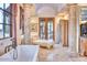 Bright bathroom featuring a soaking tub and seating area at 9547 N 55Th St, Paradise Valley, AZ 85253