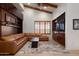 Comfortable living room featuring recessed lighting, wood beamed ceiling, and custom built-ins at 9547 N 55Th St, Paradise Valley, AZ 85253