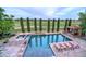 Aerial view of the pool and landscaped grounds and seating at 9547 N 55Th St, Paradise Valley, AZ 85253