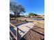 View of the community park featuring a basketball court, playground, and covered ramada at 11821 W Yuma St, Avondale, AZ 85323