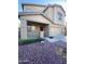 Two-story home featuring a covered porch, an attached two-car garage, and a combination of stucco and siding at 11821 W Yuma St, Avondale, AZ 85323