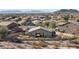 View of a well maintained single Gathering home in a desert community, featuring a nice backyard at 13121 S 178Th Ave, Goodyear, AZ 85338