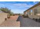 Landscaped backyard with desert plants and paved patio area at 13121 S 178Th Ave, Goodyear, AZ 85338