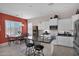 Eat-in kitchen features large window, pendant light, and island with sink and seating at 13121 S 178Th Ave, Goodyear, AZ 85338