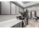 Bright kitchen view towards the dining area, showcasing stainless steel appliances and ample counter space at 13204 N 3Rd Way, Phoenix, AZ 85022