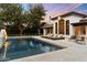 Gorgeous pool area featuring lounge chairs, mature trees, and stunning architecture at 13670 N 85Th Pl, Scottsdale, AZ 85260