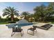 Beautiful swimming pool with a fountain feature and poolside lounge chairs set against a backdrop of palm trees at 13670 N 85Th Pl, Scottsdale, AZ 85260