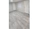 Open-concept living area features modern flooring and neutral paint offering a bright aesthetic at 1402 S 76Th Pl, Mesa, AZ 85209