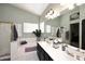 Bathroom with a bathtub and double sinks at 14460 N 100Th Way, Scottsdale, AZ 85260