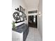 Inviting hallway featuring a built-in bar and view into the bedroom at 14460 N 100Th Way, Scottsdale, AZ 85260