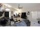 Bright living room featuring tile floors, modern furnishings, and neutral paint at 14460 N 100Th Way, Scottsdale, AZ 85260