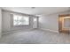 Bright living room features large windows and neutral paint at 15032 N 24Th N Pl, Phoenix, AZ 85032