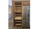 Spacious pantry with custom pull-out shelves providing organized kitchen storage at 1688 E Krystal St, Casa Grande, AZ 85122