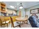 Charming kitchen area with a skylight, pendant lighting, and tile flooring at 17200 W Bell Rd # 357, Surprise, AZ 85374