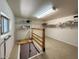 A storage area with shelving, an access door, and a window for natural light at 17200 W Bell Rd # 357, Surprise, AZ 85374