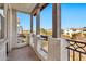 Spacious balcony with wooden beams offering scenic views of the surrounding community at 1724 E Bridgeport Pkwy, Gilbert, AZ 85295