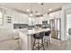 Contemporary kitchen featuring stainless steel appliances, sleek cabinetry, and a central island for food preparation at 1724 E Bridgeport Pkwy, Gilbert, AZ 85295