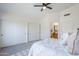 Bedroom featuring a large closet, and ensuite bathroom at 1780 E Countrywalk Ln, Chandler, AZ 85225