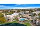 Aerial view of community pool, lake, and landscaped grounds at 1825 W Ray Rd # 1148, Chandler, AZ 85224