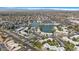 Aerial view of the community with lush landscaping, lake, and convenient shopping nearby at 1825 W Ray Rd # 1148, Chandler, AZ 85224