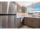 Updated kitchen showcasing sleek stainless steel appliances and modern countertops at 1825 W Ray Rd # 1148, Chandler, AZ 85224