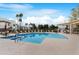 Enjoy the community pool that features lounge seating, mature trees, and a spa at 1825 W Ray Rd # 1148, Chandler, AZ 85224