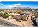 Overhead shot of home in a desert community, complete with a generous backyard and mountain views at 2031 S Cactus Rd, Apache Junction, AZ 85119