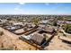 Aerial view of property in a vibrant community with desert mountain backdrop at 2031 S Cactus Rd, Apache Junction, AZ 85119