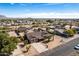 Aerial view of a desert home showcasing the community, landscape, and backyard amenities at 2031 S Cactus Rd, Apache Junction, AZ 85119