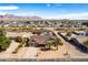 Wide aerial view of a single-story home showing the landscape and mountain views at 2031 S Cactus Rd, Apache Junction, AZ 85119