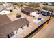 Expansive backyard featuring trampoline, boat, covered patio, and RV parking at 2031 S Cactus Rd, Apache Junction, AZ 85119