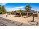 Single-story home featuring desert landscaping, a long driveway, and scenic mountain views at 2031 S Cactus Rd, Apache Junction, AZ 85119