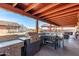 Outdoor kitchen with stainless steel grill and countertop perfect for outdoor cooking at 2031 S Cactus Rd, Apache Junction, AZ 85119