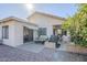 Backyard view showcases a well-maintained patio with a grill, perfect for outdoor entertaining and relaxation at 2159 Leisure World --, Mesa, AZ 85206