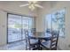 Cozy dining area featuring a round table and a view of the outdoor patio at 2159 Leisure World --, Mesa, AZ 85206