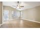 Bright and spacious main bedroom features a ceiling fan and an outside entrance at 21960 N 70Th Dr, Glendale, AZ 85310