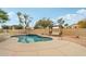 Backyard pool featuring a seating area and privacy wall for relaxing or entertaining at 21960 N 70Th Dr, Glendale, AZ 85310