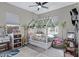 Charming bedroom with unique canopy bed, lush plant accents, and cozy seating, creating a dreamy retreat at 22854 E Sonoqui Blvd, Queen Creek, AZ 85142