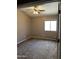 Bedroom with neutral tones, carpet, and ample natural light at 2634 N Saffron Cir, Mesa, AZ 85215