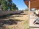 Spacious backyard with a patio, fence, and room for outdoor activities at 2839 W Villa Maria Dr, Phoenix, AZ 85053