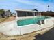 The pool in the backyard features a diving board and steps for getting into the water at 3009 W Laurel Ln, Phoenix, AZ 85029