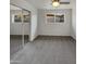 Bedroom featuring plush carpeting, a ceiling fan, and a sliding door closet at 3009 W Laurel Ln, Phoenix, AZ 85029