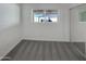 Cozy bedroom with plush carpet, a closet, and a window providing ample natural light at 3009 W Laurel Ln, Phoenix, AZ 85029