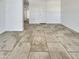 Bright living room with tile floor, door and entrance to the other areas of the house at 3009 W Laurel Ln, Phoenix, AZ 85029