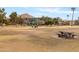 Expansive community park featuring mature trees, play areas, and mountain views, perfect for outdoor recreation and relaxation at 4131 E Minnezona Ave, Phoenix, AZ 85018