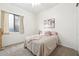 Cozy bedroom with neutral carpet, ceiling fan, window and calm decor at 4284 N 154Th Ave, Goodyear, AZ 85395