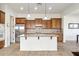 Modern kitchen with stainless steel appliances, granite countertops, and ample cabinet space at 4284 N 154Th Ave, Goodyear, AZ 85395